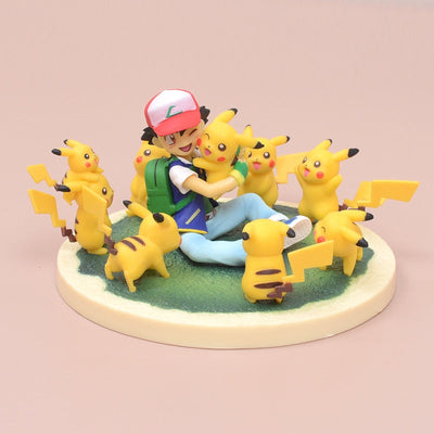 Figurine Pikachu et Sacha